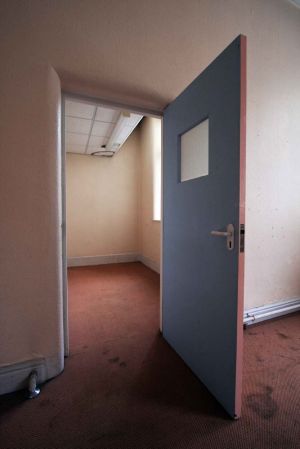 Surgical Side Ward with Opened Blue Door